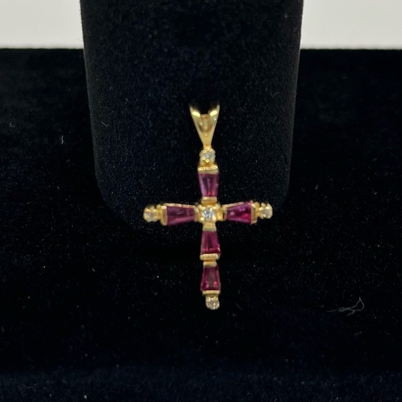 14k gold ruby and diamond cross pendant.